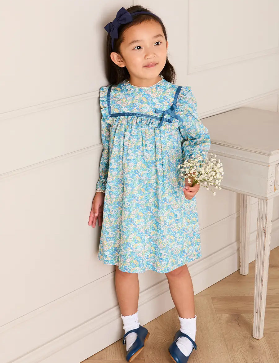 Leontyne Floral Bow Detail Long Sleeve Trapeze Dress in Blue Made with Liberty Fabric (18mths- 10yrs) Dresses from Pepa London