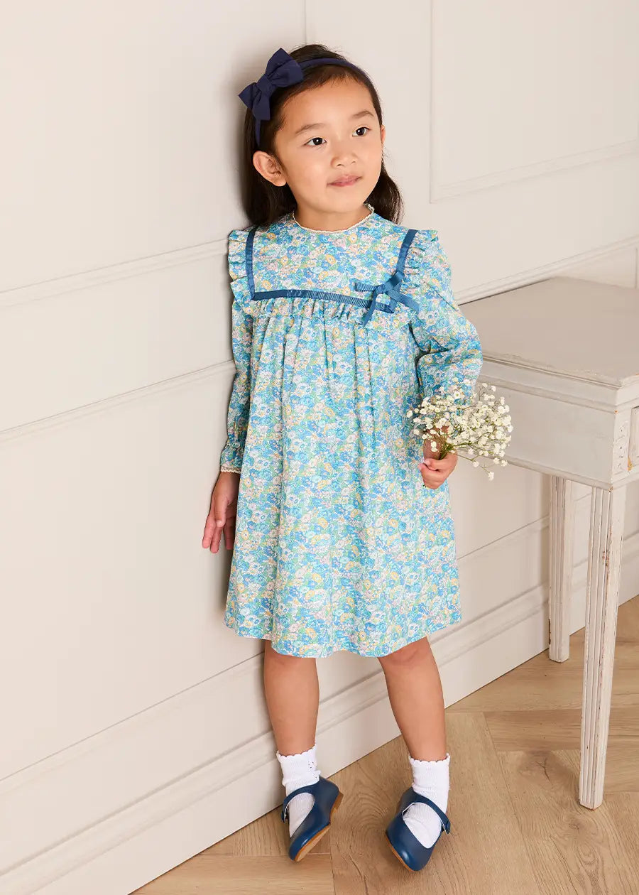 Leontyne Floral Bow Detail Long Sleeve Trapeze Dress in Blue Made with Liberty Fabric (18mths- 10yrs) Dresses from Pepa London
