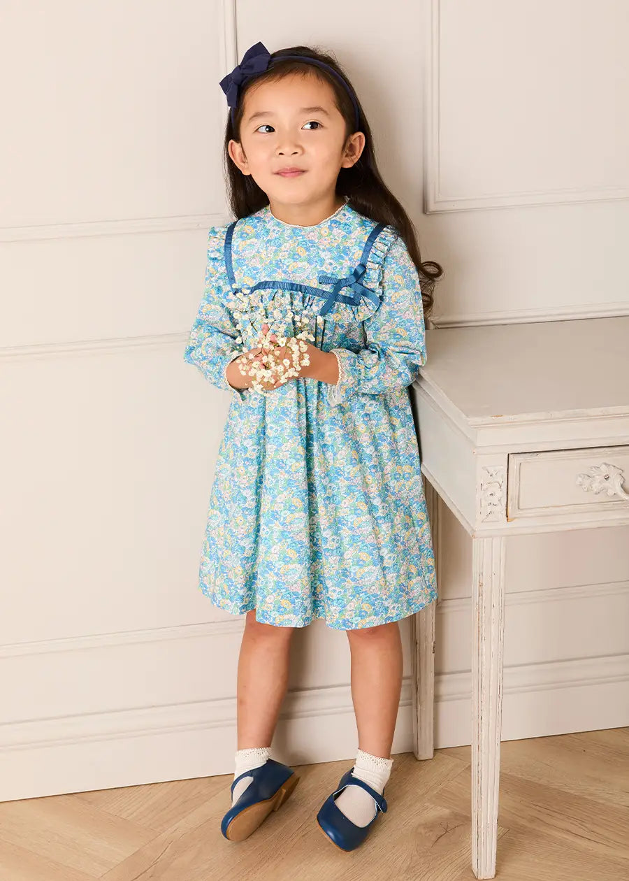 Leontyne Floral Bow Detail Long Sleeve Trapeze Dress in Blue Made with Liberty Fabric (18mths- 10yrs) Dresses from Pepa London