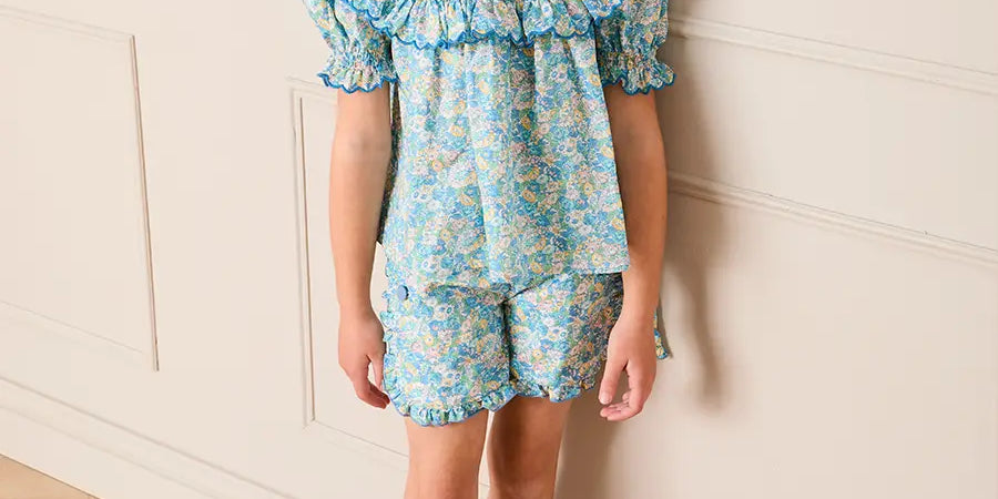 Leontyne Floral Scalloped Smocked Detail Short Sleeve Blouse in Blue Made with Liberty Fabric (2- 10yrs) Blouses from Pepa London
