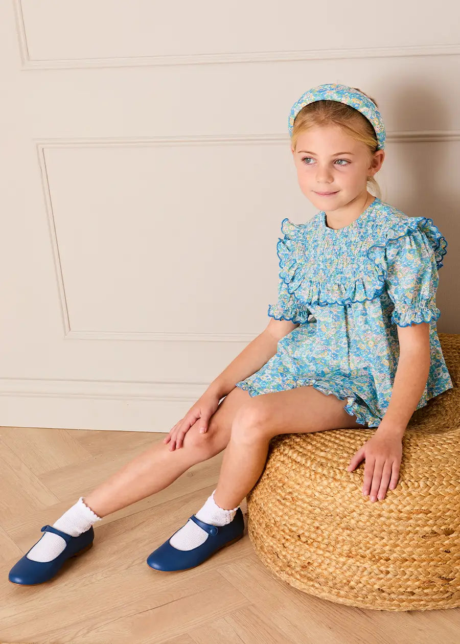 Leontyne Floral Scalloped Smocked Detail Short Sleeve Blouse in Blue Made with Liberty Fabric (2- 10yrs) Blouses from Pepa London