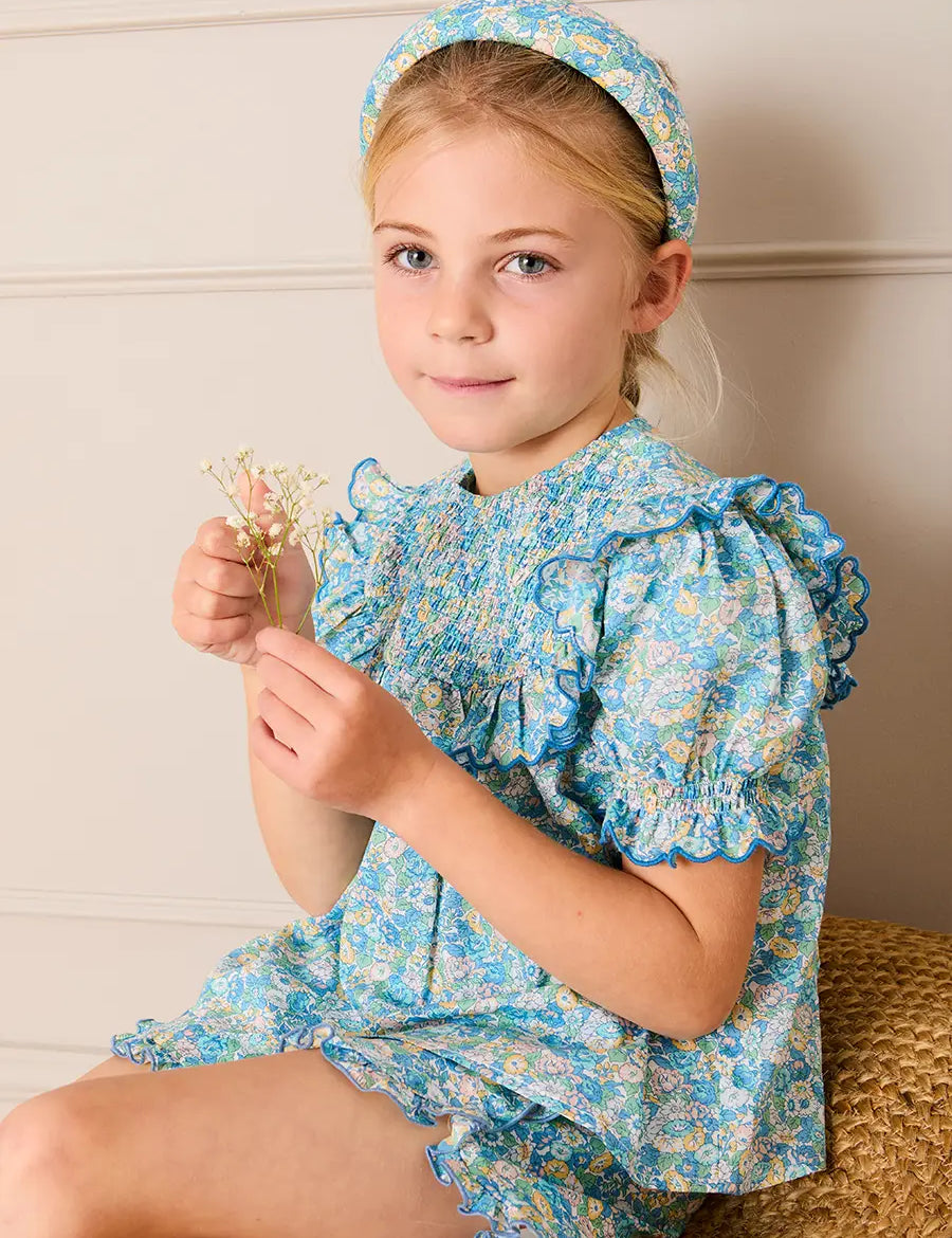 Leontyne Floral Scalloped Smocked Detail Short Sleeve Blouse in Blue Made with Liberty Fabric (2- 10yrs) Blouses from Pepa London