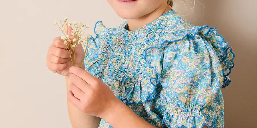 Leontyne Floral Scalloped Smocked Detail Short Sleeve Blouse in Blue Made with Liberty Fabric (2- 10yrs) Blouses from Pepa London