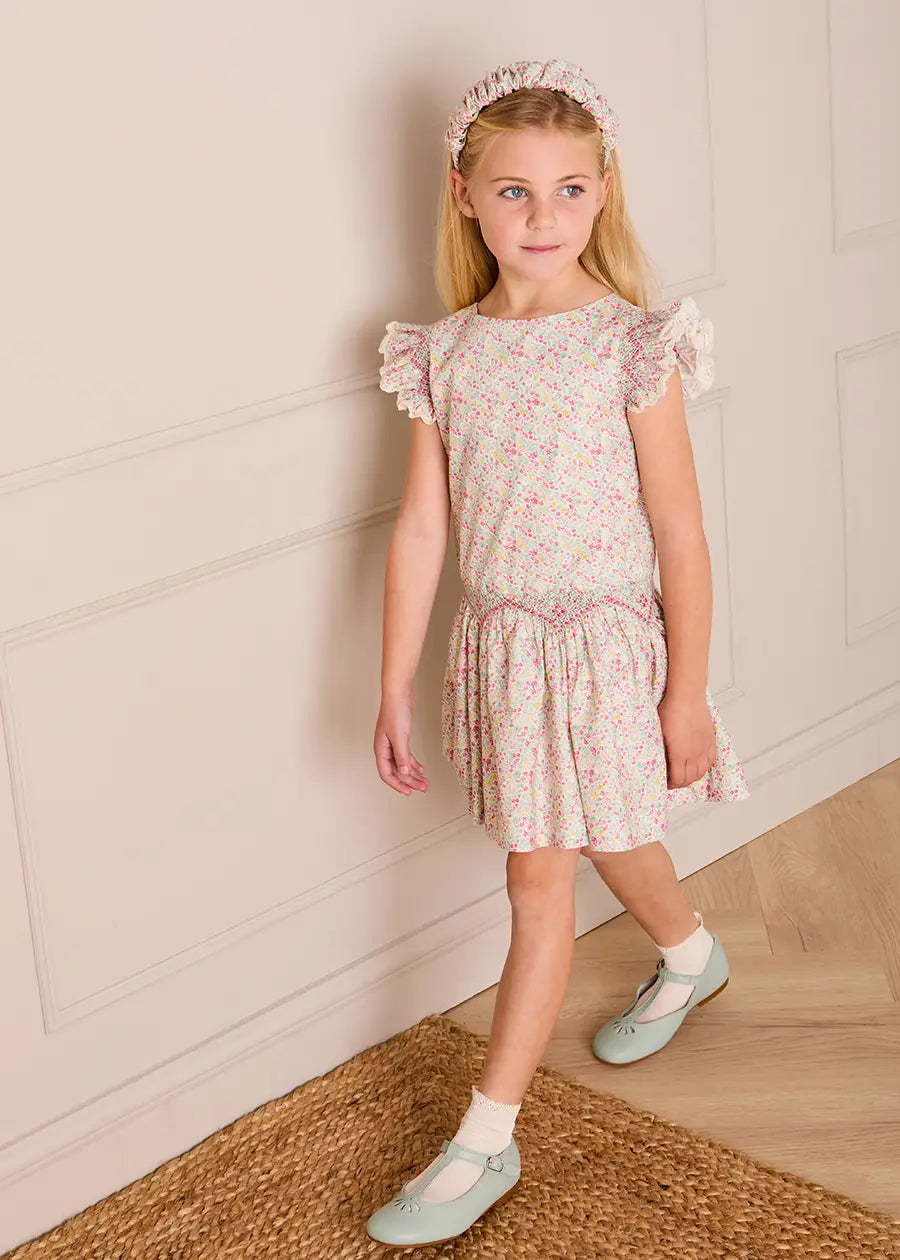 Adelaide Floral Smocked Cap Sleeve Drop Waist Dress in Pink (4-12yrs) Dresses from Pepa London