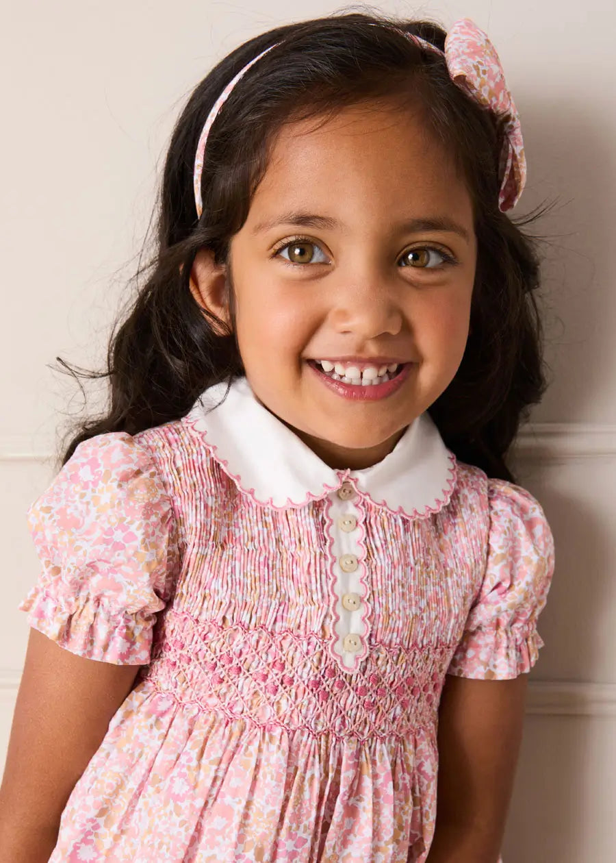 Nellie Floral Hand Smocked Embroidered Peter Pan Collar Dress in Pink Nellie Floral Hand Smocked Embroidered Peter Pan Collar Dress in Pink