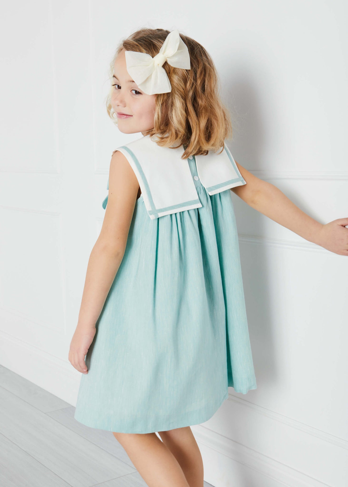 Sleeveless Trapeze Dress With Bow Detail in Green (12mths-10yrs) Dresses  from Pepa London