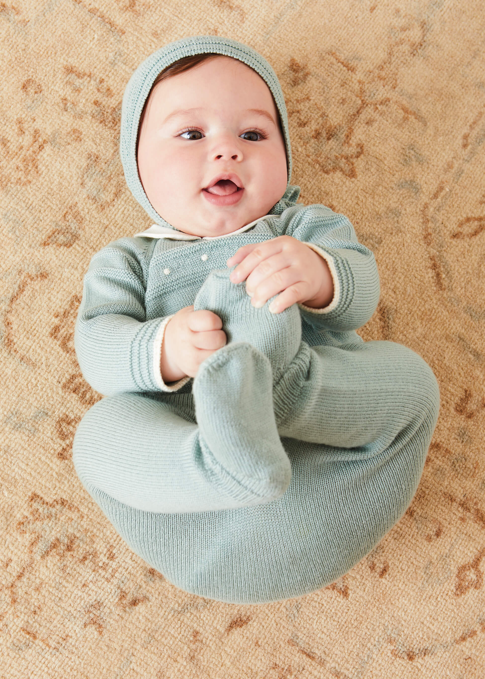 Openwork Bonnet In Green (S-L) KNITTED ACCESSORIES  from Pepa London