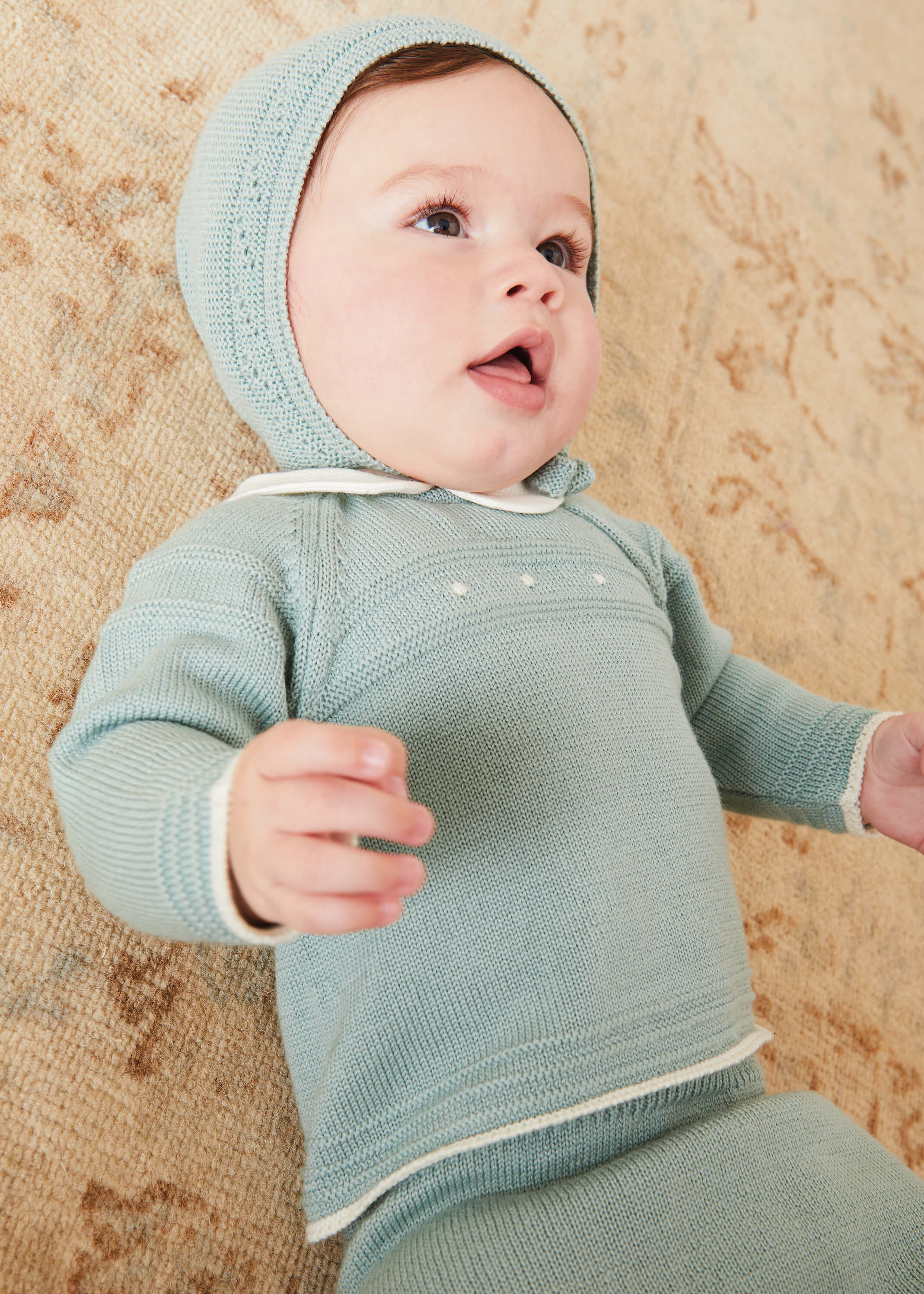 Openwork Bonnet In Green (S-L) KNITTED ACCESSORIES  from Pepa London