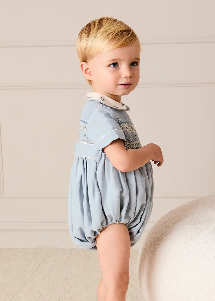 Hand Smocked Peter Pan Collar Short Sleeve Romper in Sky Blue (3mths-2yrs) Rompers from Pepa London