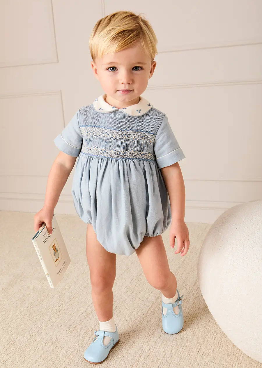 Hand Smocked Peter Pan Collar Short Sleeve Romper in Sky Blue (3mths-2yrs) Rompers from Pepa London
