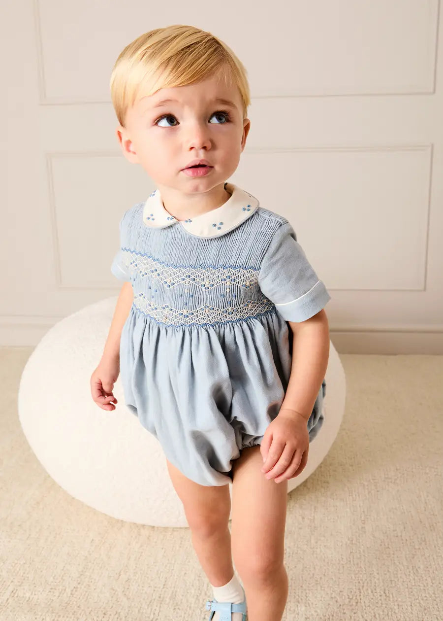 Hand Smocked Peter Pan Collar Short Sleeve Romper in Sky Blue (3mths-2yrs) Rompers from Pepa London