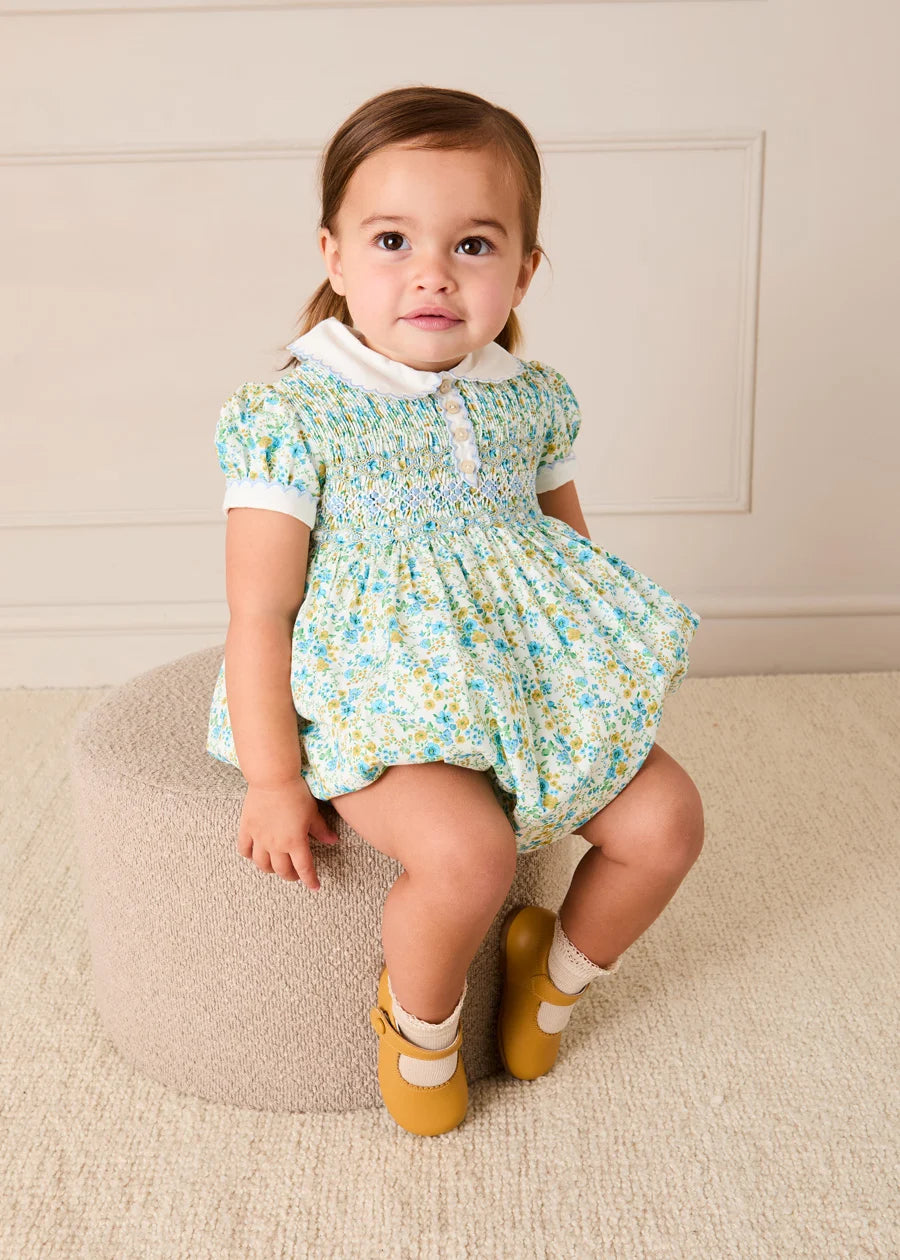 Louisa Floral Hand Smocked Short Sleeve Romper in Blue (3mths-2yrs) Rompers from Pepa London