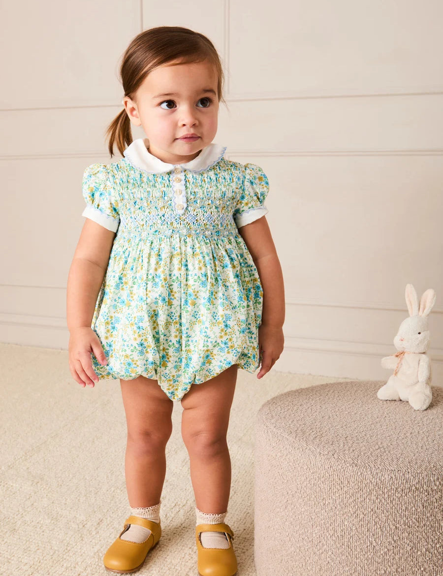Louisa Floral Hand Smocked Short Sleeve Romper in Blue (3mths-2yrs) Rompers from Pepa London