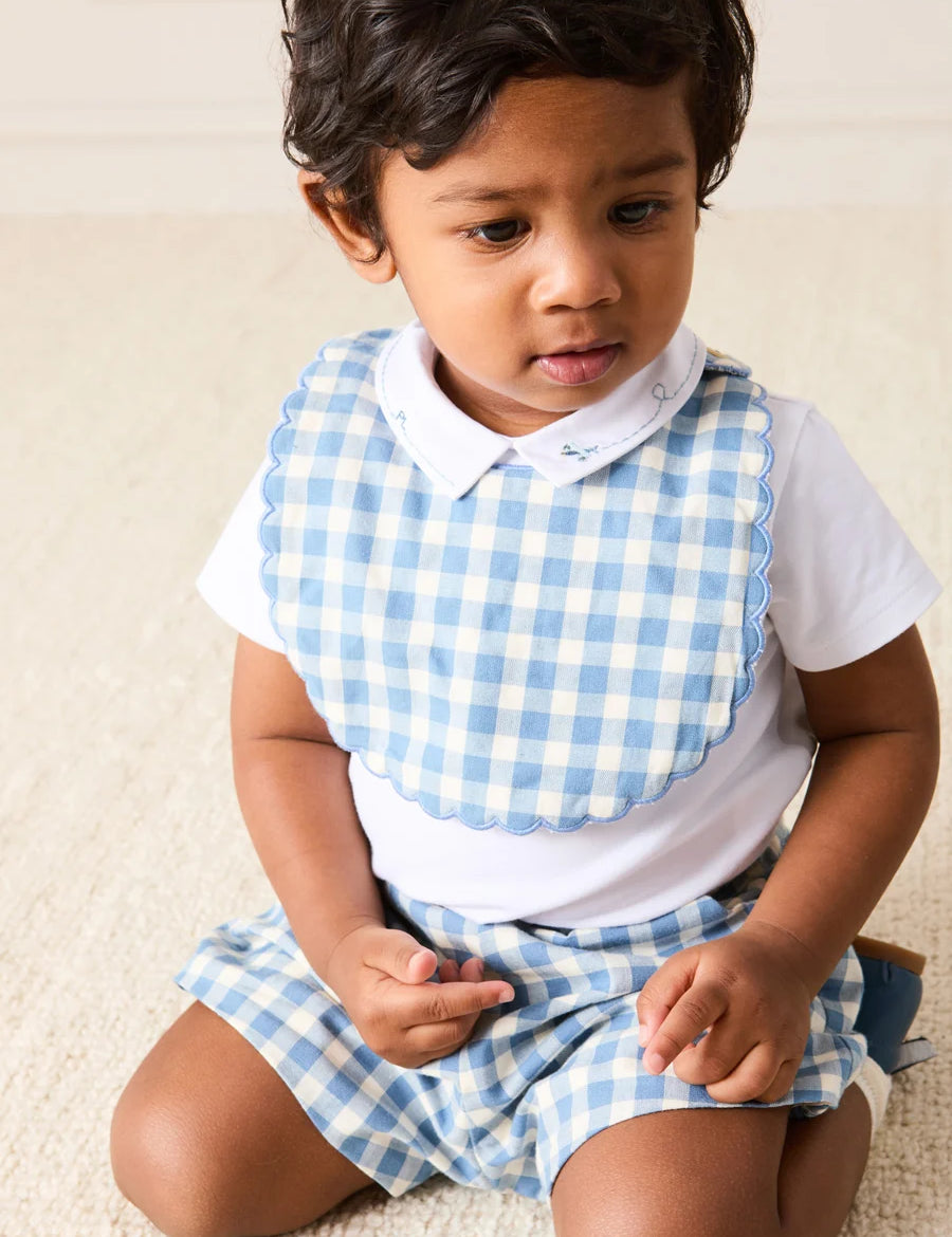 Darby Gingham Scallop Edge Lined Bib in Blue Accessories from Pepa London