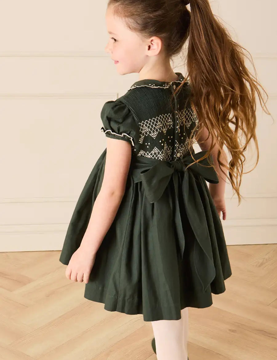 The Icon Hand Smocked Peter Pan Collar Short Sleeve Dress in Racing Green (18mths-10yrs) Dresses from Pepa London