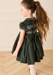 The Icon Hand Smocked Peter Pan Collar Short Sleeve Dress in Racing Green (18mths-10yrs) Dresses from Pepa London