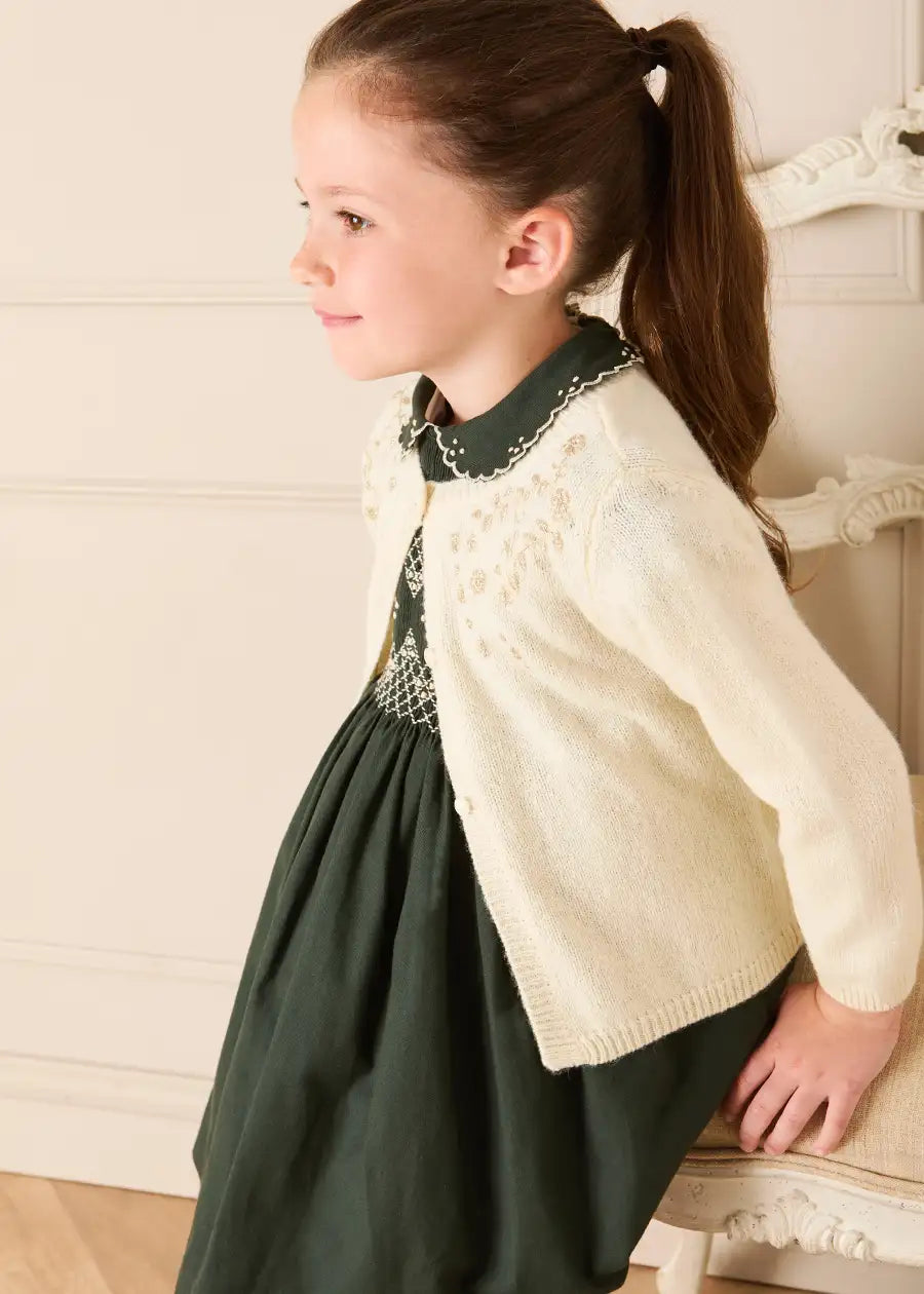 The Icon Hand Smocked Peter Pan Collar Short Sleeve Dress in Racing Green (18mths-10yrs) Dresses from Pepa London