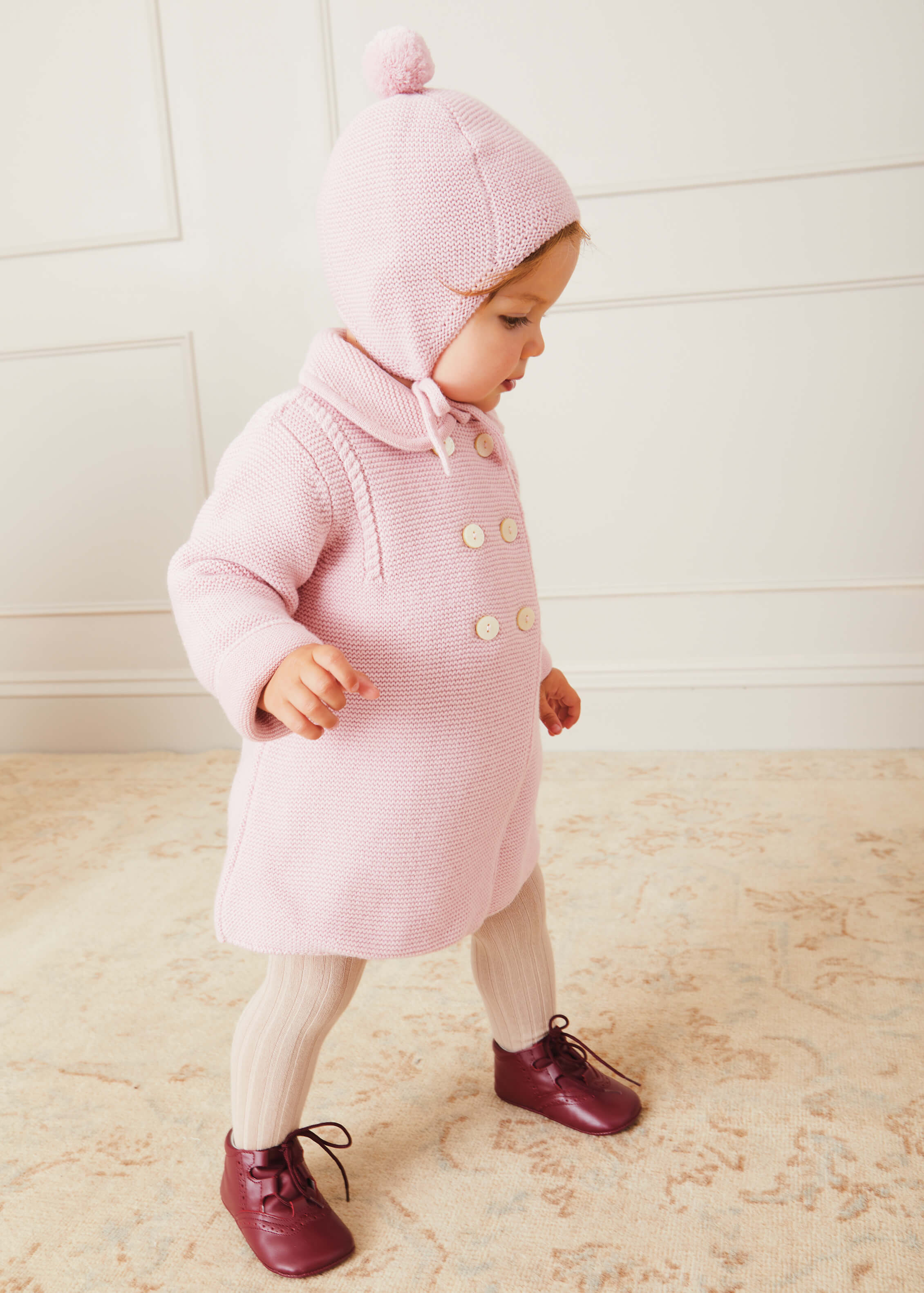 Merino Wool Pom Pom Hat In Pink (S-L) KNITTED ACCESSORIES  from Pepa London