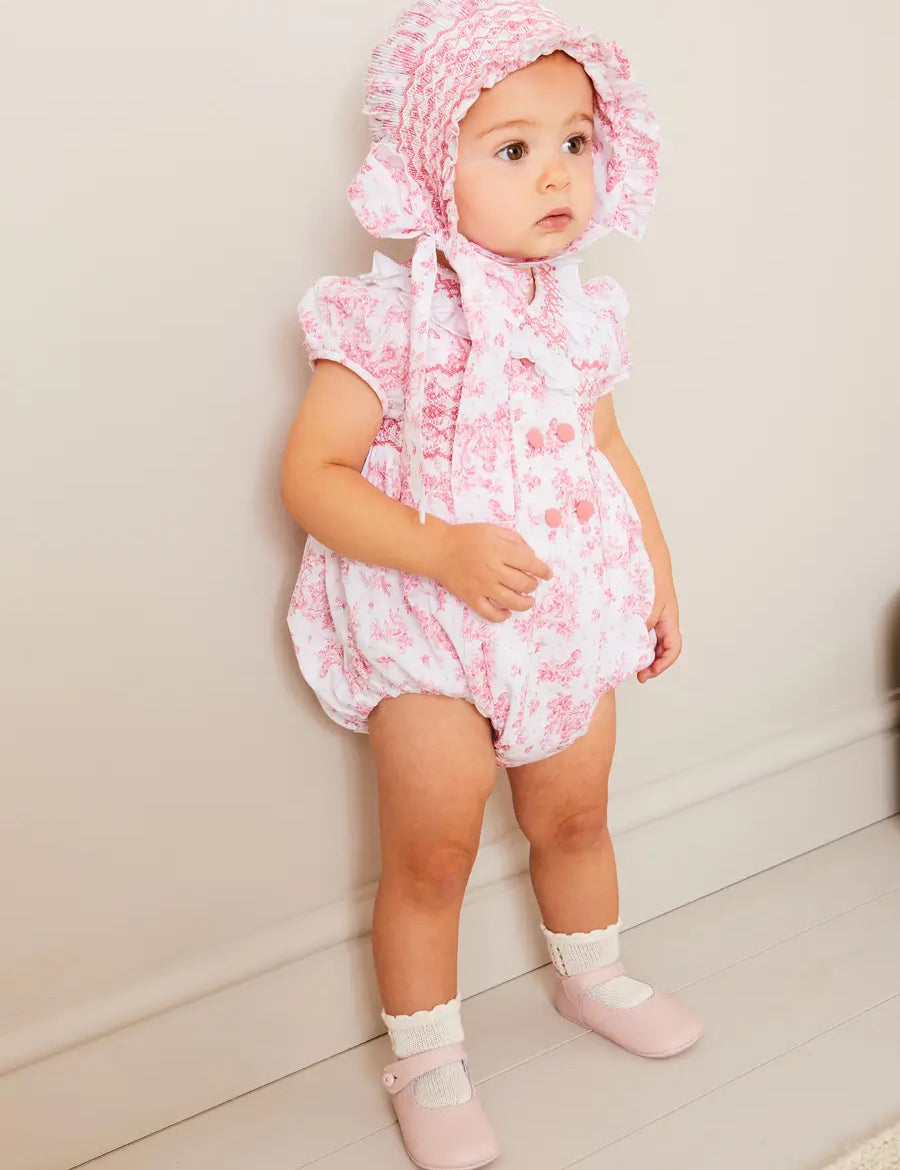 Audrey Hand Smocked Double Breasted Short Sleeve Romper in Pink (6mths-2yrs) ROMPERS from Pepa London