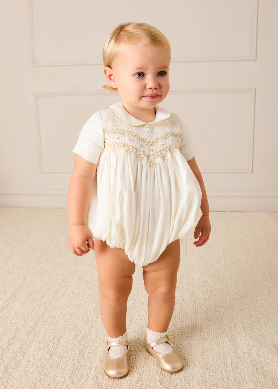 Hand Smocked Gold Embroidered Short Sleeve Romper in Ivory (3mths-2yrs) Rompers from Pepa London