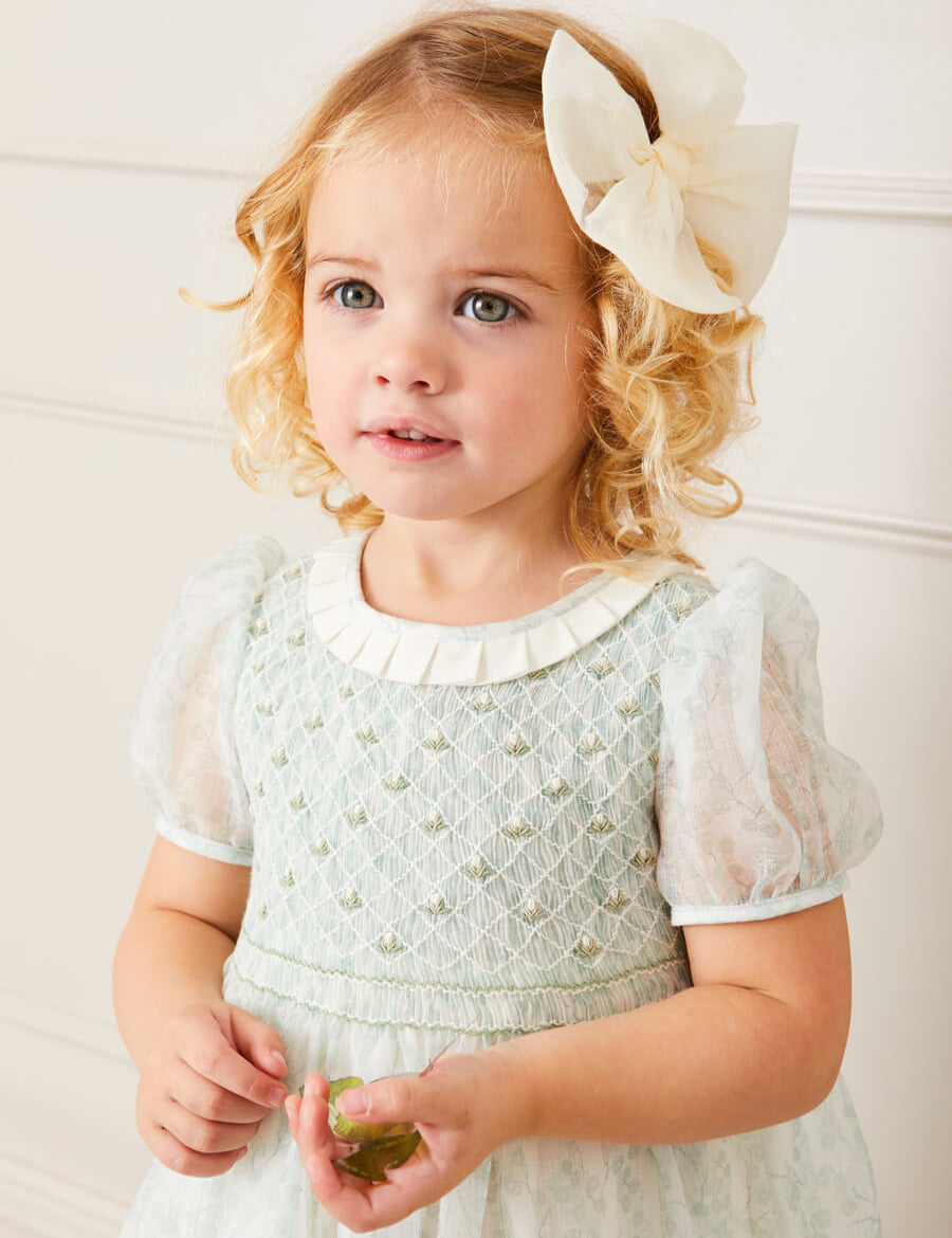 Constance Floral Print Hand Smocked Short Sleeve Party Dress in Light Green (12m-10yrs) Dresses from Pepa London