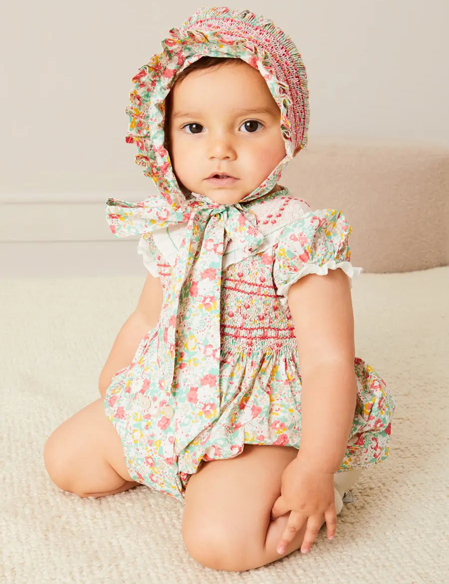 Clementine Floral Hand Smocked Double Breasted Short Sleeve Romper in Coral (6mths-3yrs) ROMPERS from Pepa London