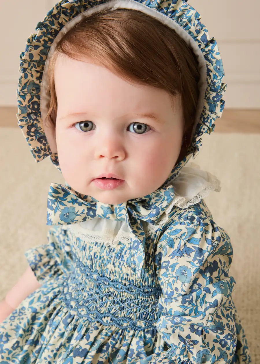 Daphne Floral Hand Smocked Long Sleeve Romper in Blue (6mths-3yrs) Rompers from Pepa London