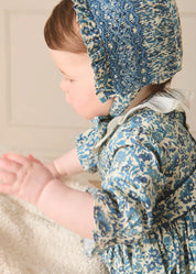 Daphne Floral Hand Smocked Long Sleeve Romper in Blue (6mths-3yrs) Rompers from Pepa London