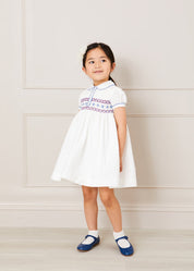 Hand Smocked Plumetti Short Sleeve Dress in White (12mths-6yrs) Dresses  from Pepa London