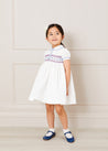 Handsmocked Plumetti Short Sleeve Dress in White (12mths-6yrs) Dresses  from Pepa London