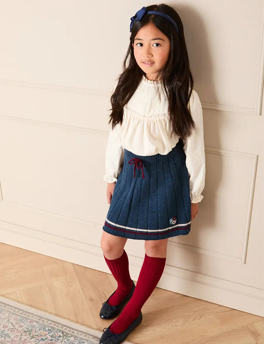 Pleated Floral Embroidered Knitted Skirt in Navy (4-10yrs) Skirts from Pepa London