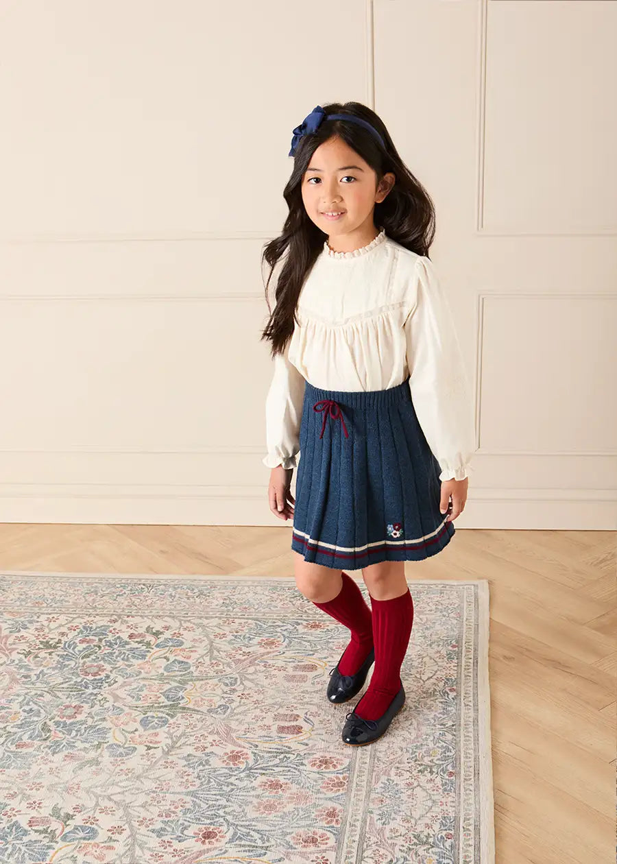 Pleated Floral Embroidered Knitted Skirt in Navy (4-10yrs) Skirts from Pepa London