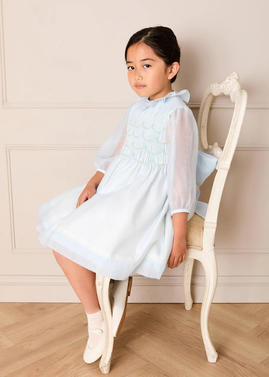 Daisy Embroidered Hand Smocked Long Sleeve Dress in Blue (18mths-8yrs) Dresses from Pepa London