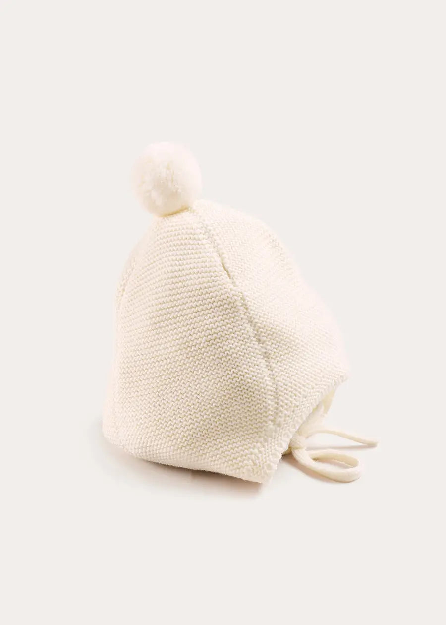 Merino Wool Pom Pom Hat in Cream (S-L) Knitted Accessories from Pepa London