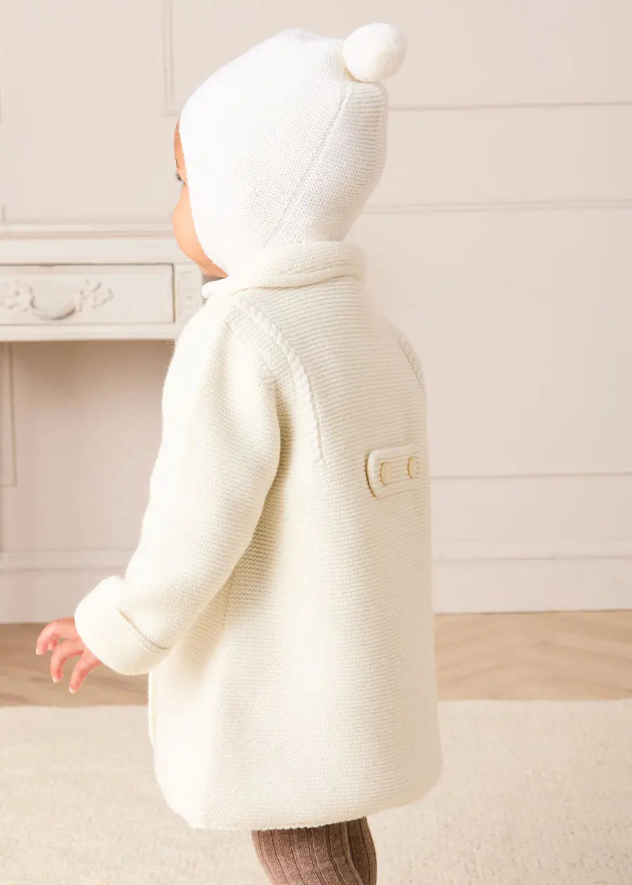 Merino Wool Pom Pom Hat in Cream (S-L) Knitted Accessories from Pepa London