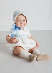 Classic Off-White Blue Hand Smocked Romper (3-18mths) Rompers  from Pepa London