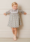 Emilia Floral Print Pleated Front Long Sleeve Dress in Green (18mths-10yrs) Dresses  from Pepa London