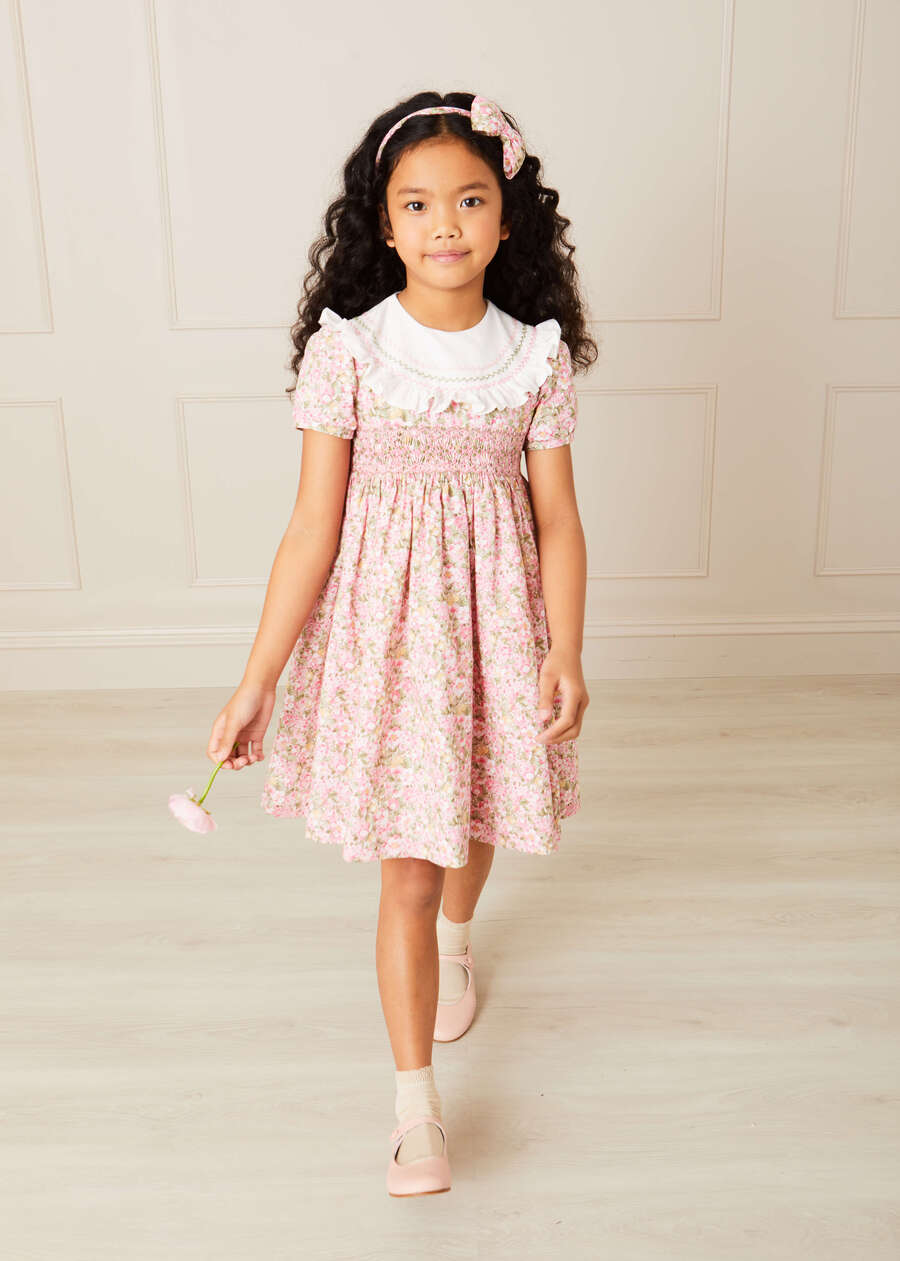 Eloise Floral Print Hand Smocked Short Sleeve Dress in Pink (12mths-10yrs) Dresses  from Pepa London