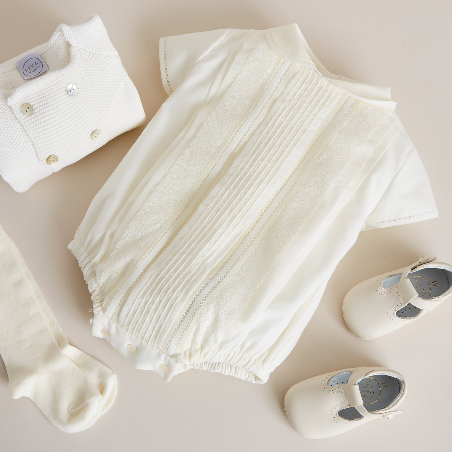 Ivory Panelled Christening Romper (3-12mths) Rompers  from Pepa London