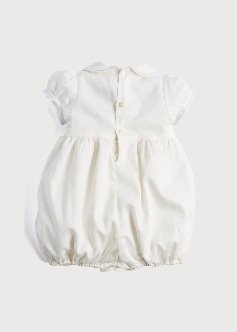 Classic Off-White Blue Hand Smocked Romper (3-18mths) Rompers  from Pepa London