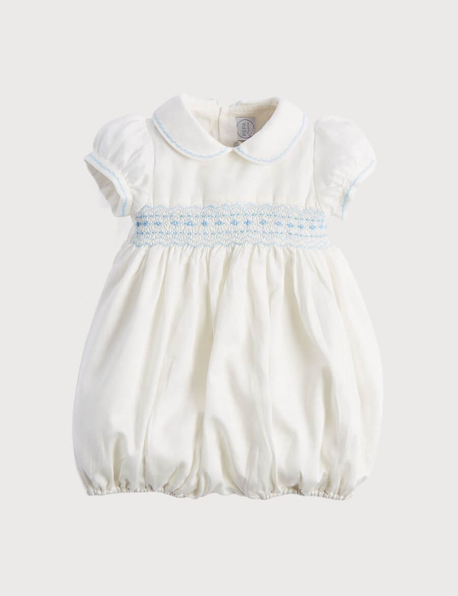 Classic Off-White Blue Hand Smocked Romper (3-18mths) Rompers  from Pepa London