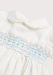 Classic Off-White Blue Hand Smocked Romper (3-18mths) Rompers  from Pepa London