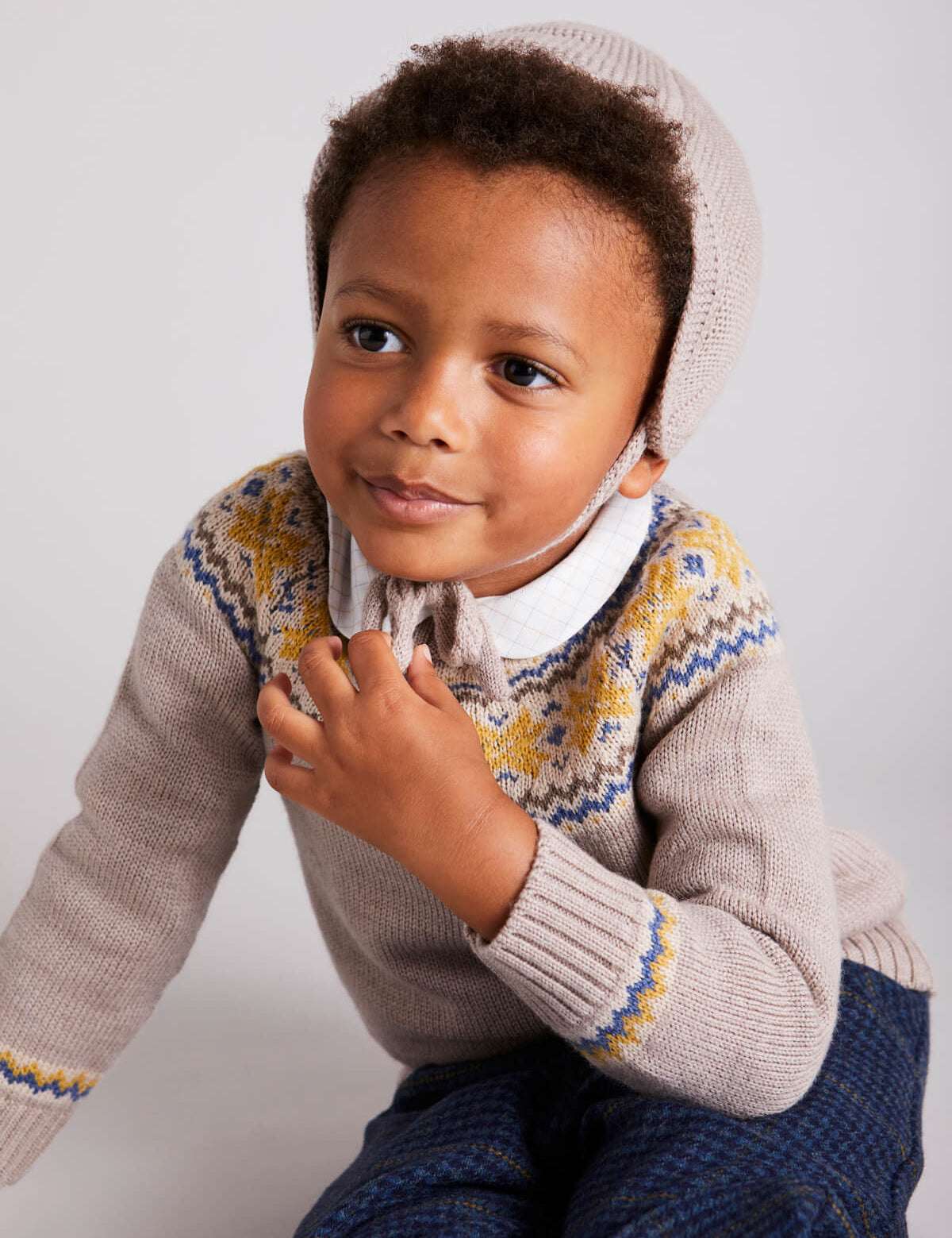 Knitted Merino Wool Winter Bonnet in Oatmeal (S-L) Knitted Accessories  from Pepa London