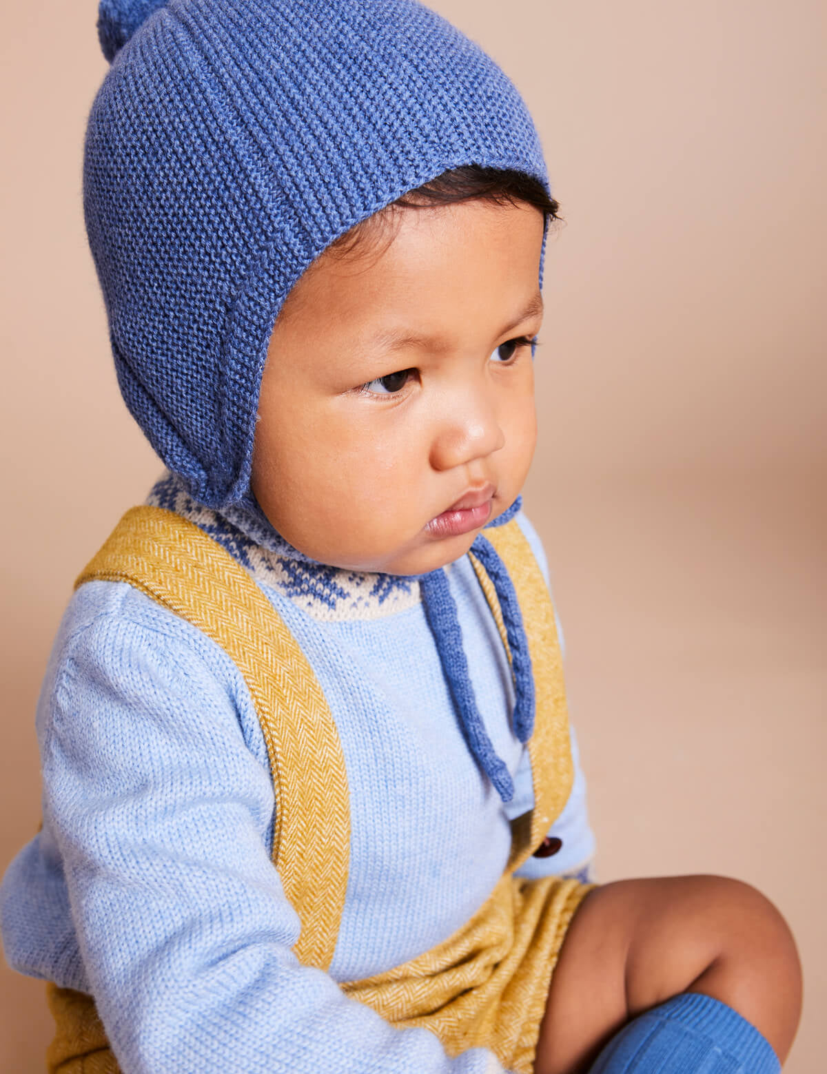 Knitted Merino Wool Winter Bonnet in Blue (S-L) Knitted Accessories  from Pepa London