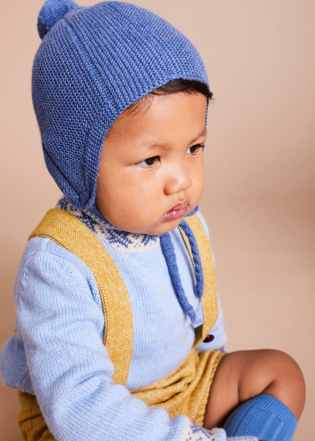 Knitted Merino Wool Winter Bonnet in Blue (S-L) Knitted Accessories  from Pepa London